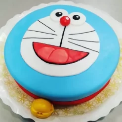 Cheering Doraemon Fondant Cake from LallanTop Cake Shop - Delivery in East Delhi, South-East Delhi, Ghaziabad, and Noida.