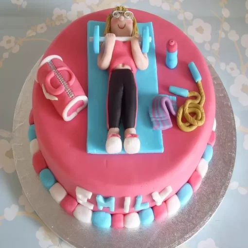 girl gym theme fondant cake from lallantop cake shop noida and east delhi From LallamTop Cake Shop